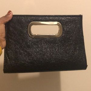 Black glitter and gold clutch